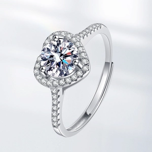 Adjustable heart halo moissanite ring with pave diamonds on a polished silver band