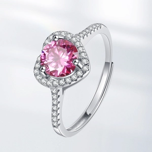 Adjustable silver halo ring with a heart-shaped pink stone and small white crystals