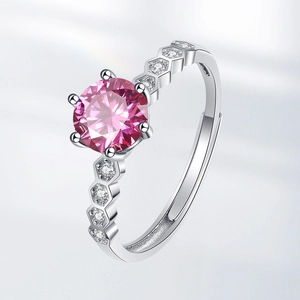 Honeycomb silver ring with a large round pink zircon in a six-prong setting