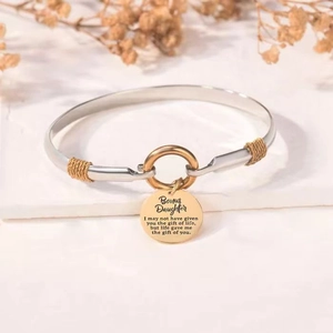 Bracciale bicolore argento e oro con ciondolo rotondo e dedica incisa d'affetto