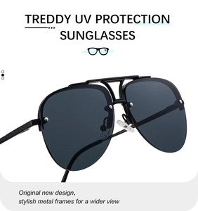 Close-up of black double-bridge metal frames and UV protection lenses on aviator sunglasses