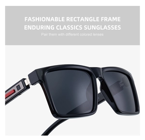 Macro view of rectangular black sunglasses with red and silver metal temple hinge details