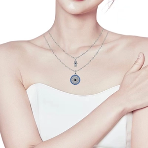 Double-layer Hamsa Hand and Evil Eye pendant necklace with blue and white zircon stones