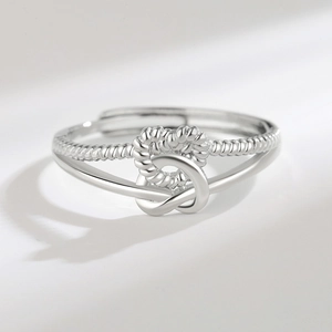 Silver interlocking heart twist open ring with a dual-band design for women