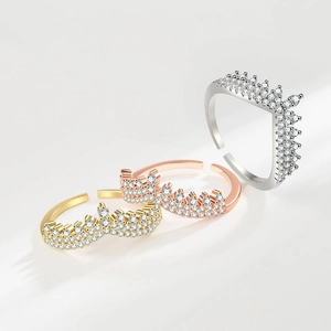 Elegant V-shaped crown ring with micro-pave crystals in gold, silver, and rose gold