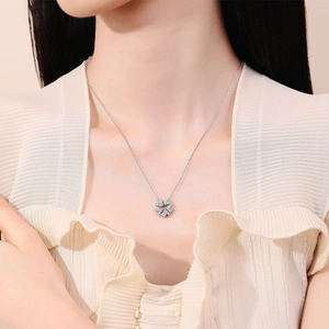 Elegant Ferris wheel necklace with zircon pendants on model in light beige outfit