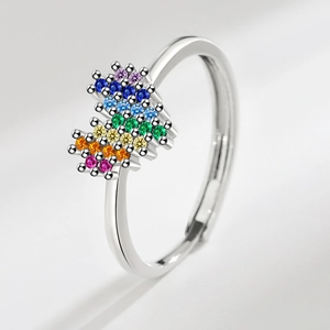 Adjustable silver ring featuring vibrant rainbow zircon heart inlay in a minimalist design