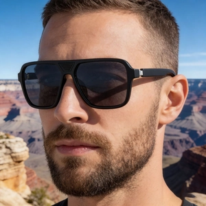 Detail of square polarized sunglasses with textured frame and non-slip top design