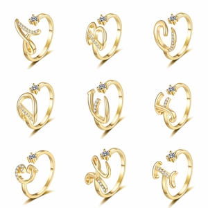 Detail of adjustable gold-plated letter rings A-I with sparkling CZ micro-pave setting