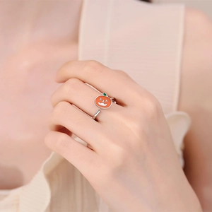 Adjustable sterling silver pumpkin spinner ring for anxiety relief with orange enamel
