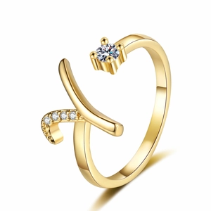 Detailed view of adjustable gold open ring with round main stone and pave-set diamond accents