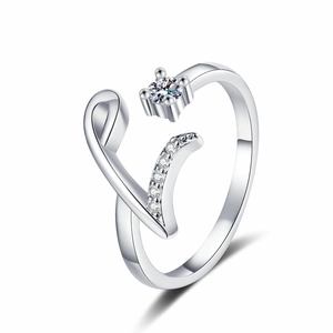 Detailed view of silver music note open ring featuring zircon pave and adjustable band