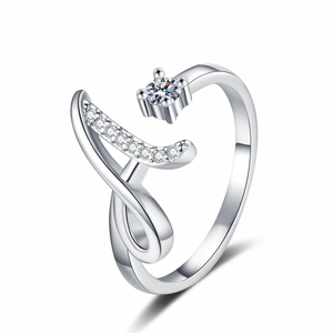 Macro detail of silver adjustable ring with sparkling zircon and spiral pave crystals