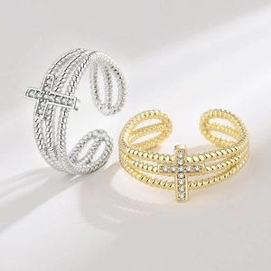 Minimalist zircon cross ring with braided band in gold and silver finish for women