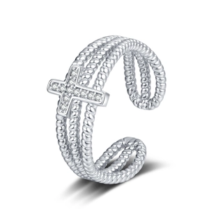 Vintage multi-layer silver ring with cross pendant and shimmering cubic zirconia stones