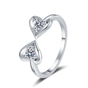 Minimalist double heart silver ring with sparkling round zircon in an open design