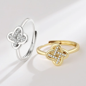 Adjustable four-leaf clover rings in gold and silver with pave zircon stones