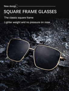 Detail of square black and gold double-bridge sunglasses on a rugged mineral rock
