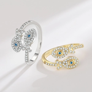Adjustable fish rings in gold and silver finish with pavé cubic zirconia and blue stones