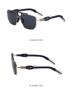 Detail view of modern square sunglasses with black lenses and gold industrial metal frame