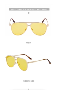 Detail view of gold metal pilot sunglasses with yellow lenses and double bridge design