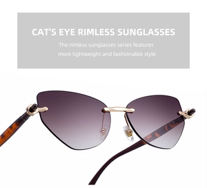 Détail de lunettes de soleil œil de chat sans monture avec verres dégradés dorés