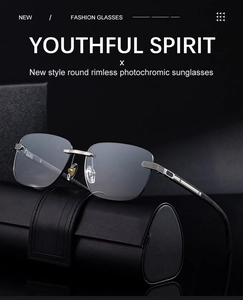 Close-up of photochromic rimless sunglasses with metal bridge and precision hinges