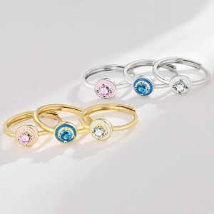 Set of six adjustable enamel rings with round moissanite in gold and silver finishes