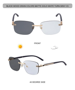 Detail view of rimless photochromic sunglasses with black wood grain temples and metal bridge