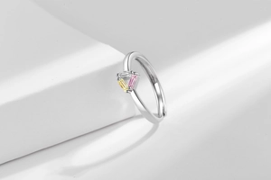 Macro view of adjustable silver ring featuring colorful rectangular zircon stones