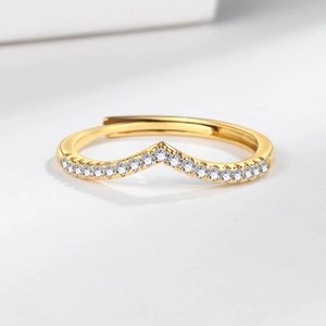 Elegant gold V-shaped moissanite ring with micro-paved sparkling stones for women