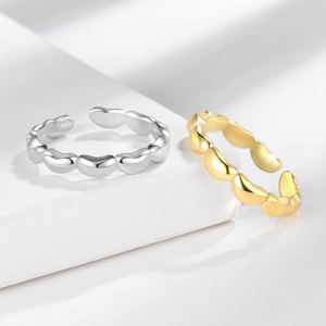 Set aus polierten Herz-Gliedringen in Gold und Silber, verstellbar für Damen