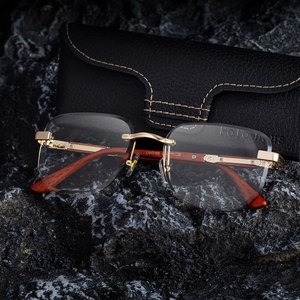 Randlose selbsttönende Sonnenbrille mit Holzmaserung-Bügeln und Lederetui