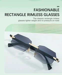 Detail of rimless polygon sunglasses with gradient lenses and gold metal nose bridge