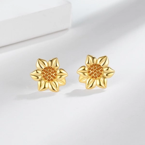 Exquisite golden sunflower stud earrings with shimmering orange zircon stones in the center