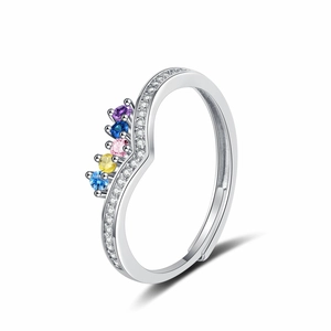 Silver wavy ring featuring colorful gemstones and zircon accents on white background