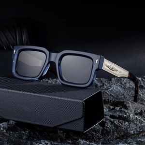 Retro square polarized sunglasses with translucent blue frame and engraved metal temple