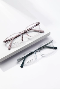 Detail view of stylish square transparent optical frames with metal temple accents
