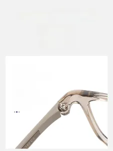 Macro detail of high-quality metal hinge and model number 145 C3 on eyewear frames