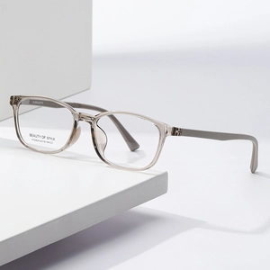 Chic transparent tea square eyeglass frames with a minimalist 2025 geometric design