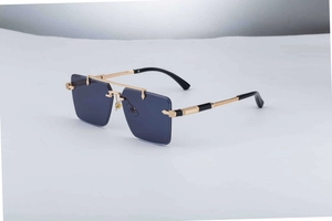 Close-up of frameless square sunglasses with blue lenses and gold metal double bridge