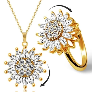 Dettaglio del set di gioielli girasole rotante con cristalli e finitura dorata