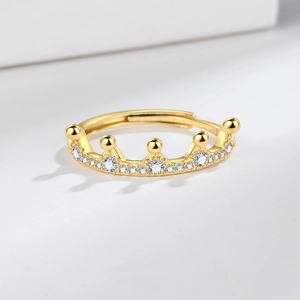Elegant gold crown ring with cubic zirconia crystals in an adjustable open band design