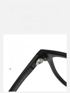 Macro view of durable silver metal hinge on black square optical glasses frame