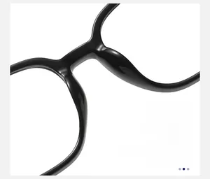 Detailed macro view of smooth nose pads on black square optical eyeglass frames