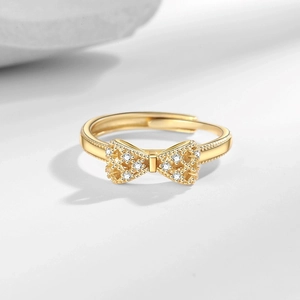 Adjustable gold butterfly ring with hollow wings and sparkling white cubic zirconia