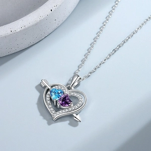 Cupid's arrow heart pendant necklace with bicolor blue and purple stones in silver