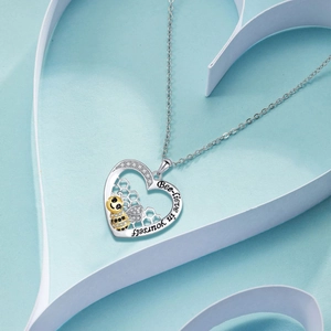 Silver heart necklace with honeycomb bee pendant and Bee-lieve in yourself engraving