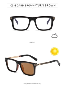 Detail of square photochromic sunglasses showing black frame with gold metal stripe accents