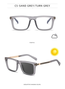 Detail of square photochromic sunglasses in sand grey with gold metal temple accents